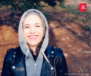 a woman smiling at the camera